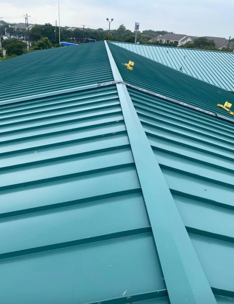 Green commercial metal roof ridge and valley for Metal Roof Repair in Port LaBelle